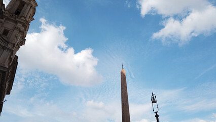 The Fountain of the Four Rivers with the Obelisco Agonale and the Church of Sant'Agnese in Agone viewed from Piazza Navona.