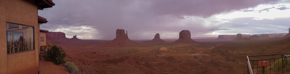Monument Valley Navajo Tribal Park in Arizona, USA. View of a storm over the Sentinel Mesa, West...