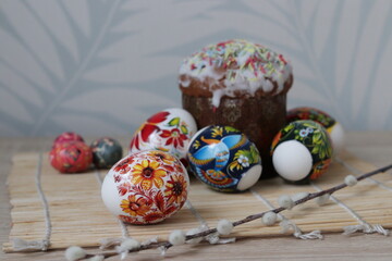 Easter, brightly colored Easter eggs and Easter cake. Celebration traditions