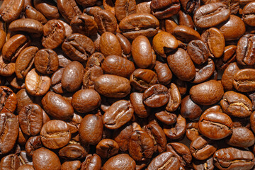 Roasted coffee beans, textured background