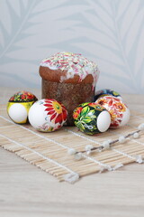 Easter, brightly colored Easter eggs and Easter cake. Celebration traditions