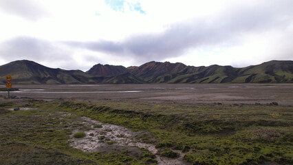 Landmannalaugar is a location in Iceland's Fjallabak Nature Reserve in the Highlands. It is on the edge of the Laugahraun lava field. This lava field was formed by an eruption in 1477.