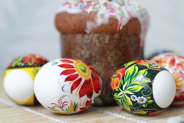 Easter, brightly colored Easter eggs and Easter cake. Celebration traditions