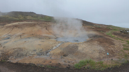 Seltún - the colourful Geothermal Area at Krýsuvík, Iceland. Krýsuvík geothermal area is defined by mud pots, hot springs, and steaming vents. The multi-colored mineral deposits at Krysuvik.
