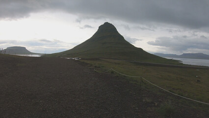 The Kirkjufell, or Church Mountain, is a distinctly shaped peak found on the north shore of...