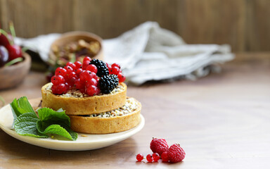 mini cake with fresh berries for dessert
