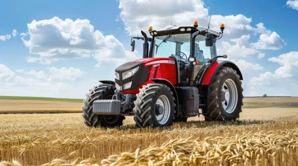 Fotobehang red modern tractor in a field of oats   © Chaynam