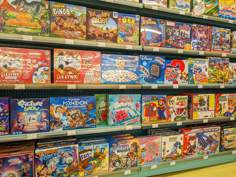 France, March 2 2024: Variety of Board Games Displayed on Store Shelves.