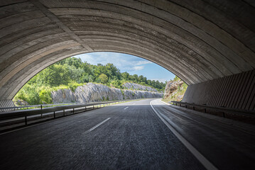 Tunnel on a highway. A tunnel in a mountain on a country highway.