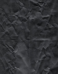 texture of folded crumpled black toner paper, cool poster overlay, magazine cover layer.