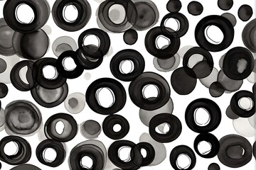 Black ink stain circles in a white background