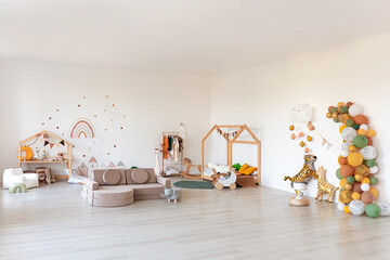Kids room interior in contemporary, Scandinavian style. Wooden bed, sofa and toys. Cozy room for child. - 749983386