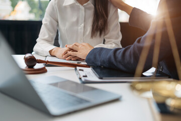 Lawyer comforts his clients with legal advice and serious stress trust commitment for justice...