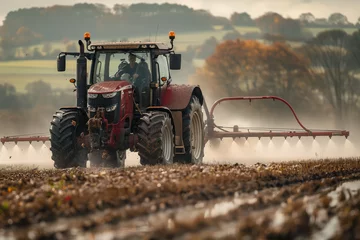 Gordijnen farm work, spraying the field with tractor and sprayer © Ale