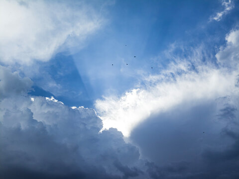 sun rays and clouds