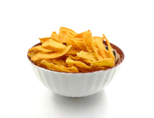 Photo of a bowl of crispy chips, isolated on white background.