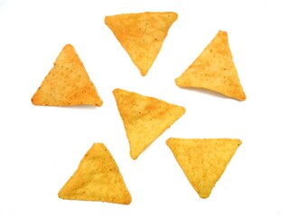 Top view of crispy nachos, isolated on white background.
