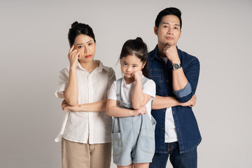 Asian family portrait posing on white background