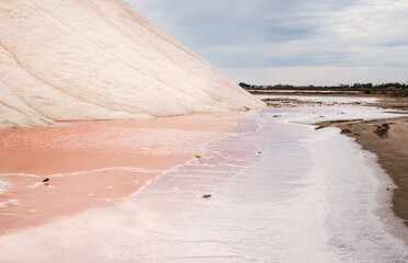 Camargue, France. Europe's largest salt marshes Salin-de-Giraud, sea salt production, pink sea salt lake, Salins d’Aigues-Mortes. 