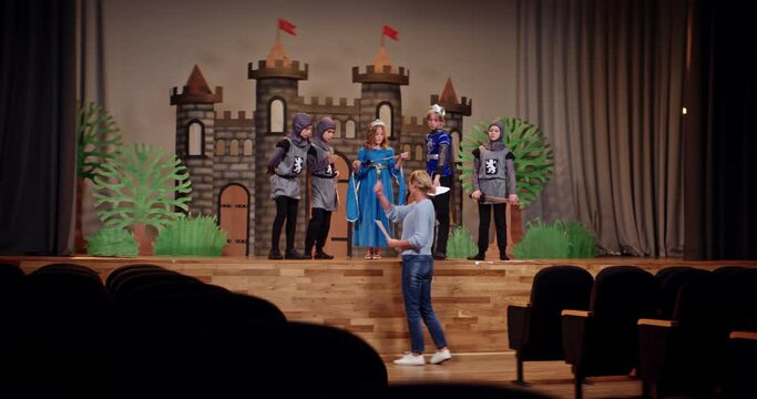 Behind the Scenes of a School's Concert Rehearsal on a medieval topic
