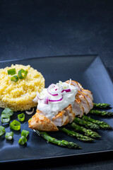 Green asparagus with grilled chicken fillet and couscous