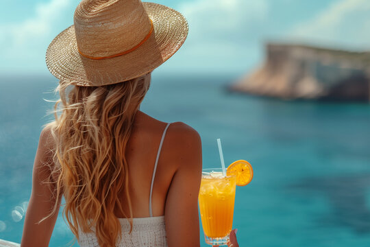 Luxury Vacation on a Cruise Ship with Elegant Woman Enjoying A Cocktail on Deck with Sea and Ocean Views