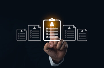 Hand Selecting Glowing HR Document Icons. A hand touching a glowing clipboard icon among multiple...