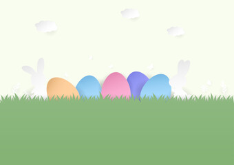 Fototapeta na wymiar Paper easter eggs and rabbits on green background