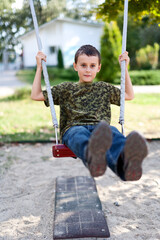 Happy child in a swing