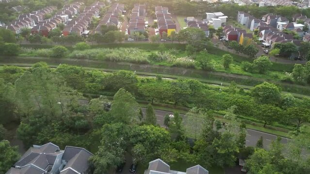 Hyperlapse Aerial Perspective: Residential Housing Roofs from Above, Roads Connecting Communities