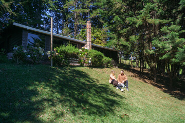 Couple sitting on a grass 