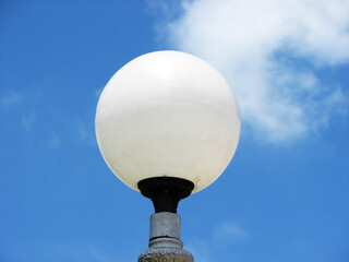 Closeup of an old spherical street lamp