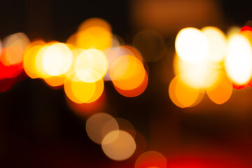 Bokeh background orange lights,Circles of yellow lights out of focus,Amber...