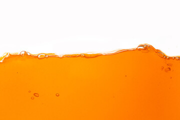 Orange juice isolated white background,orange juice texture on white background,Close up bright orange juice texture for health and nature waves