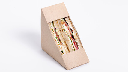 Sandwich in paper isolated on white
