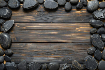 frame from stones on wooden background