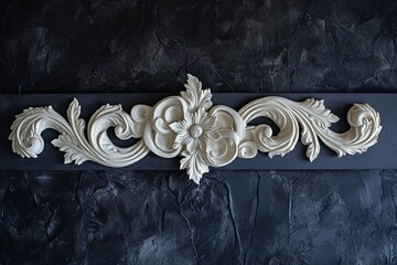 Decorative clay stucco with an ornament on a dark ceiling or wall in an abstract classic dark interior	
