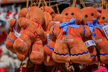 Strasbourg, France - May 31 2023: Traditional Alsatian gingerbread man plush toys on display at a...