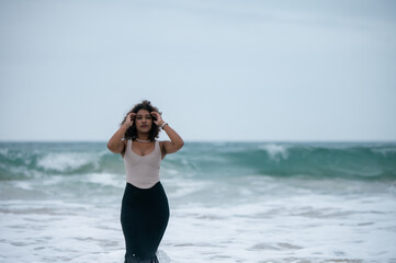 Portrait of woman seen standing in water