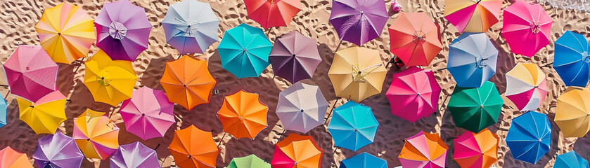 Colorful Beach Umbrellas from Aerial View