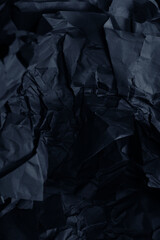 Abstract black paper texture background. Top view.