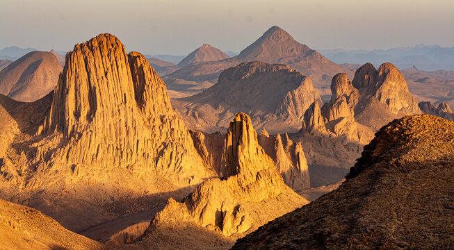 Hoggar landscape in the Sahara desert, Algeria. A view of the mountains and basalt organs that stand around the dirt road that leads to Assekrem.