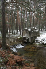 Old cottage by a stream near Madrid