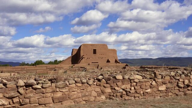 Pecos National Historic Park in New Mexico. Pecos Pueblo Mission Church Mission Nuestra Se&ntilde;ora de los &Aacute;ngeles de Porci&uacute;ncula de los Pecos, a Spanish mission near the pueblo. Fast moving clouds.