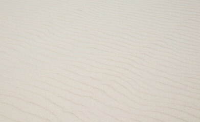 Fototapeta na wymiar sand texture with waves