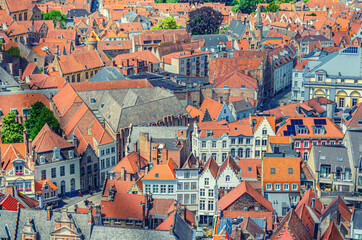Bruges cityscape top aerial view of Bruges historical city centre with old traditional Flemish style buildings red tiled roofs, Brugge old town quarter district, West Flanders province, Belgium