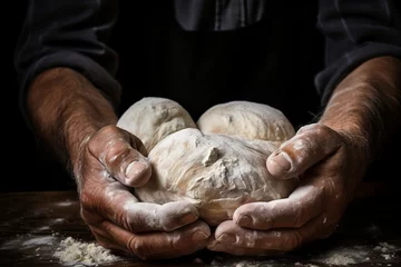 Schilderijen op glas Close-up of female hands kneading dough for delicious bread and rolls on plain, neutral background © Александр Клюйко