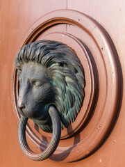 View on the old castle elements at the spring tower door window handle