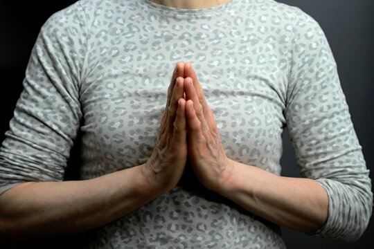praying to God with hand together and worshiping god with people stock image stock photo	