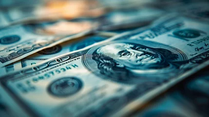 Fotobehang Close-up of hundred dollar bills in soft focus. © tiagozr